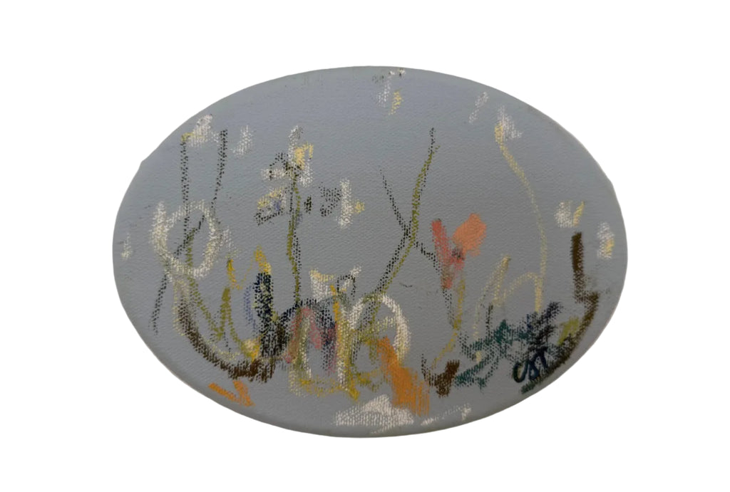An oval hand-painted canvas wall art piece featuring an abstract floral design in muted blue-gray, white, yellow, orange, and brown tones, mounted on a textured off-white wall.